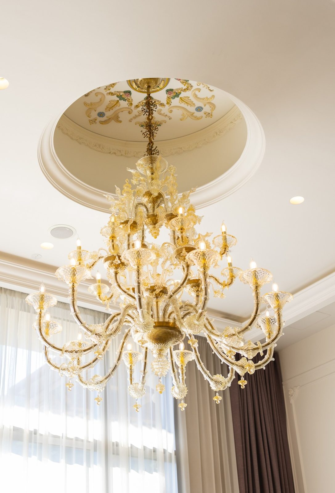 A hand-crafted gold Murano glass chandelier